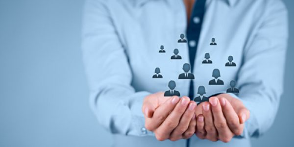 Customer care, care for employees, labor union, CRM, and life insurance concepts. Protecting gesture of businesswoman or personnel with icons representing group of people.
